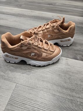 Fila Disruptor II Premium sneakers in a rose gold metallic color